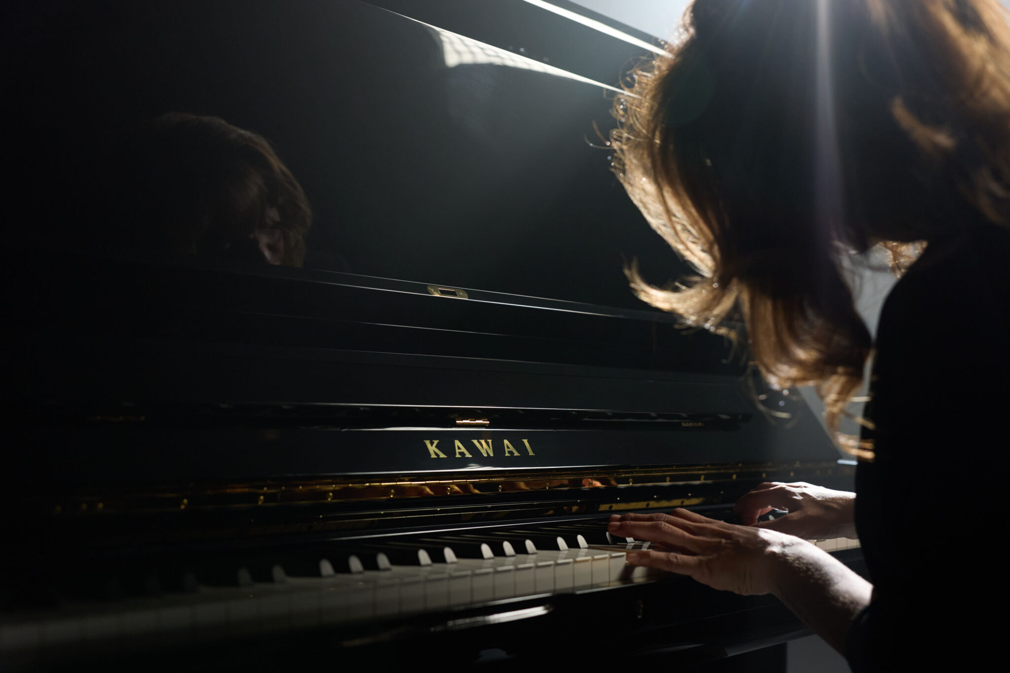 Ambre playing Kawai Master Series upright piano